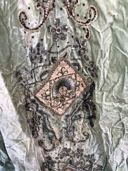 null Document of a sumptuous embroidered evening gown, circa 1900,

skirt in green...