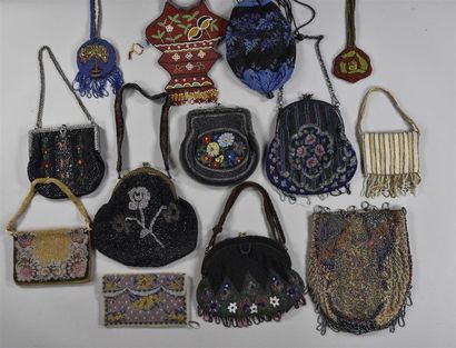 null Fourteen reticules, pouches and minaudières in pearl embroidery, circa 1920-1930,

most...