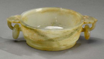 CHINE - XIXe siècle 
Circular ceremonial cup in lightly veined and rusty celadon...