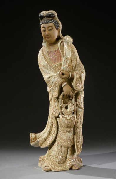 JAPON - Epoque MEIJI (1868-1912) 
Kwanin in Kyoto shaded glazed stoneware, holding...
