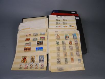 null Twelve albums from all over the world with a very large number of stamps, including...