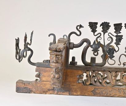 null Panel placed on the axle of a cart, in carved wood decorated with wrought and...
