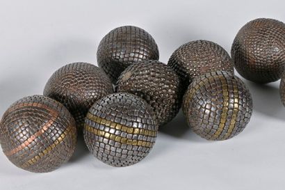 null Ten boules of pétanque from Lyon in studded wood
XIXth century

We join a modern...