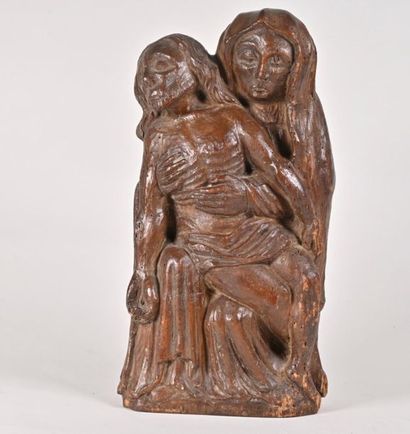 null Pieta
Carved wooden group 
Popular work of the 19th century
H. 38 cm W. 20 cm
Stitches...