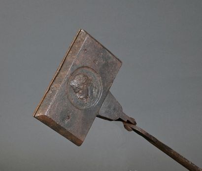 null Wrought iron waffle iron with a medallion decorated with a profile of Napoleon...