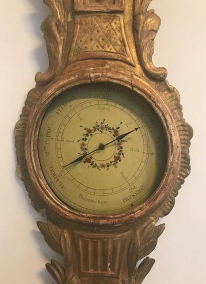 null "Barometer thermometer in a gilded wood frame carved with foliage. Late 18th,...