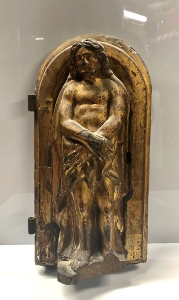 null "*A tabernacle door representing the Christ of Mercy, in carved and gilded wood...