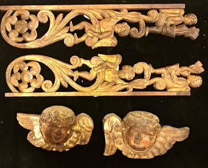 null "*A set of carved and gilded wooden decorative elements, two angel heads and...