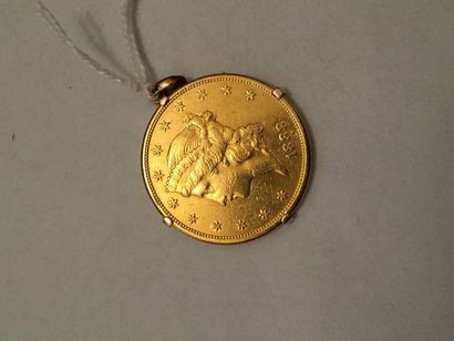 null "Une piece de 20 $ or ""Liberty"", frappée à San Fransco en 1888. Monté en pendentif....