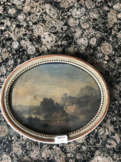 null Early 19th century FRENCH school Undulating landscape by a lake Oval oil on...