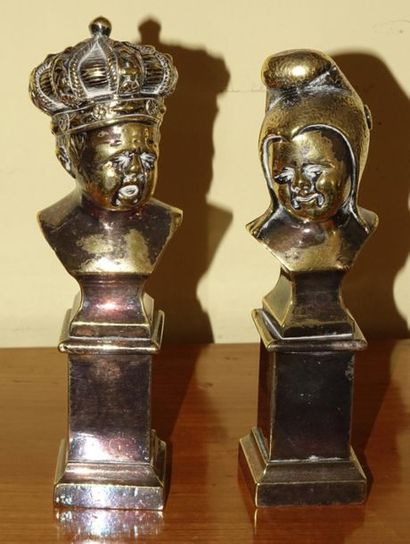 null Pair of satirical busts in silvered bronze (unsilvered) and patinated representing...