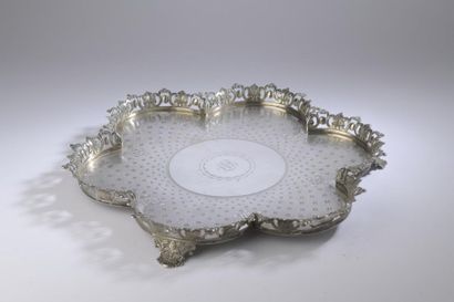 null Tripod polylobed silver tray with openwork gallery of foliage, the bottom guilloche...