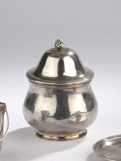 null Covered sugar bowl in plain silver in the form of a baluster resting on a small...