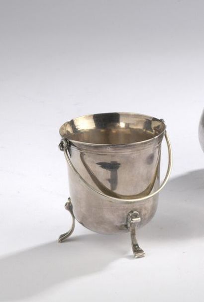 null Tripod bite jar in plain silver, the collar underlined with nets. 
Transformations,...