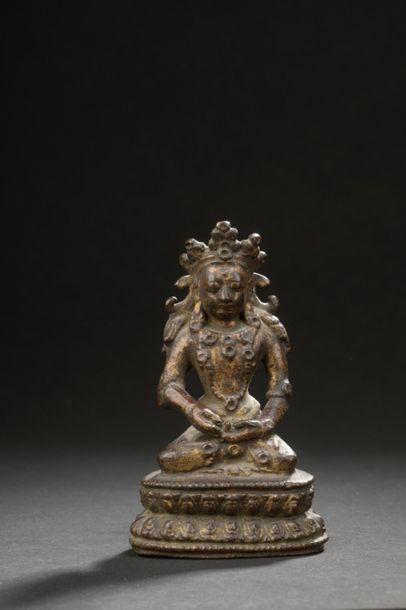 null TRAVAIL SINO-TIBÉTAIN -XVIIe siècle
Statuette de bouddha en bronze laqué or...