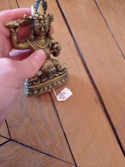 null TIBET - XIIe/XIIIe siècle
Statuette en laiton de Vajrapani debout sur deux démons...