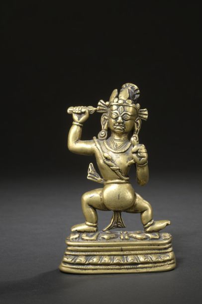 null TIBET - XIIe/XIIIe siècle
Statuette en laiton de Vajrapani debout sur deux démons...