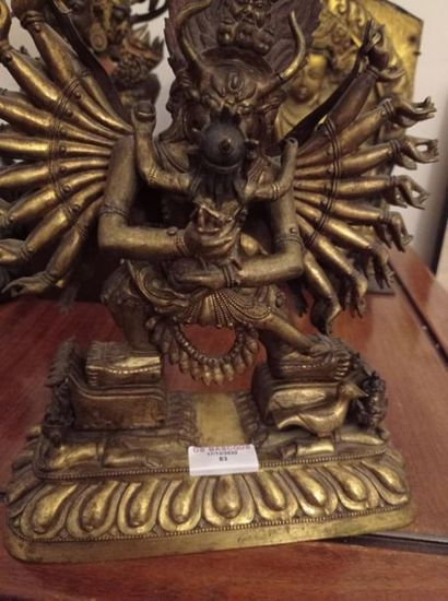 null TIBET - XVIIIe siècle
Statuette Yamanthaka en bronze doré de à neuf têtes et...