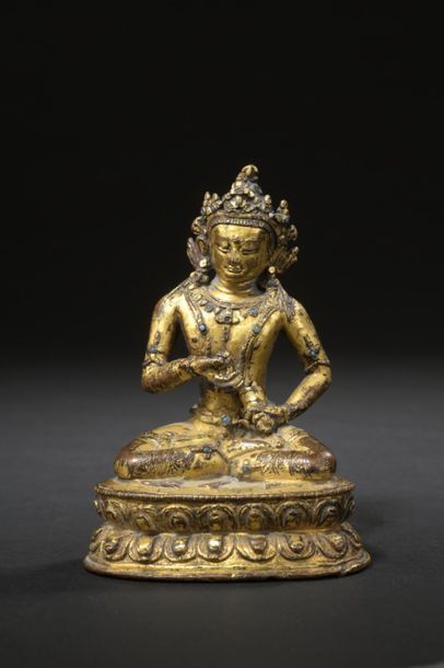 null TIBET - XVIIe siècle
Statuette en bronze doré de Vajrasattva en bronze doré,...
