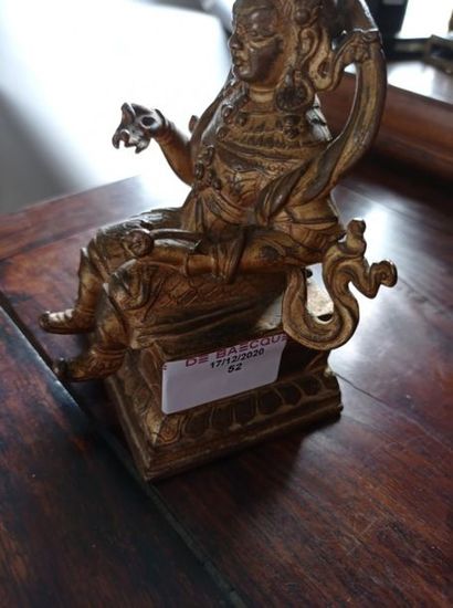 null TIBET - XVIe siècle
Statuette en bronze doré de Virupaksa assis à l'européenne...