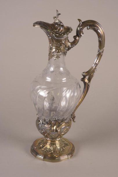 null Aiguière en cristal, la monture en argent
Style Louis XV 
Minerve
H. 33 cm