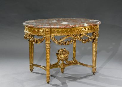 null Importante table ovale de milieu en bois et stuc doré sculpté, la ceinture à...