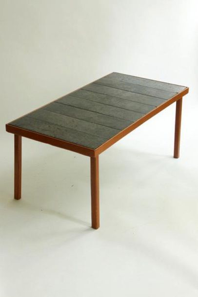 null Dans le goût de Jacques ADNET (1900-1984)
Table basse, structure en métal gainée...