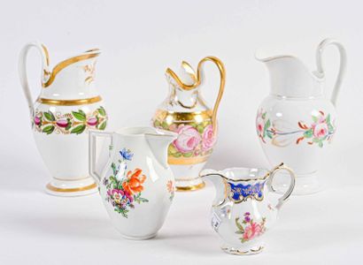 null Five porcelain milk jugs with 19th and 20th century flower decoration
Broken...