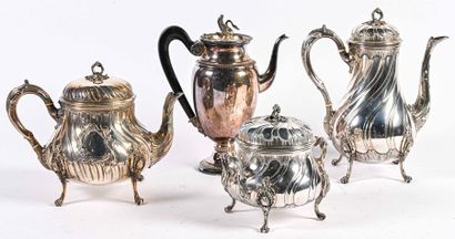 null Silverware set including; teapot, sugar bowl, coffee pot and covered pourer
Minerve...