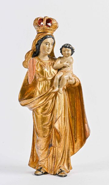 null Virgin and Child in carved gilded wood 

eighteenth century 

H. 36.5 cm W....