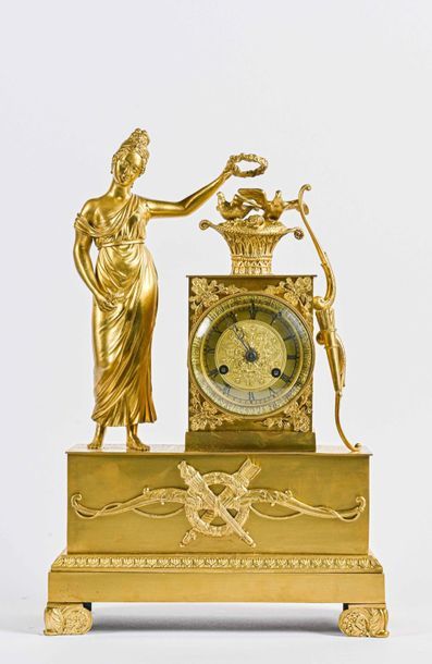 null Clock in gilded bronze and circled with an allegory of love
Restoration style
H....