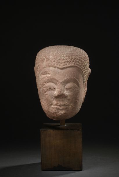 null THAILAND - 15th century

Pink sandstone Buddha head with half-closed eyes, sketching...