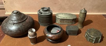 null Bronze and brassware set including: betel boxes, a small vase etc.

A covered...
