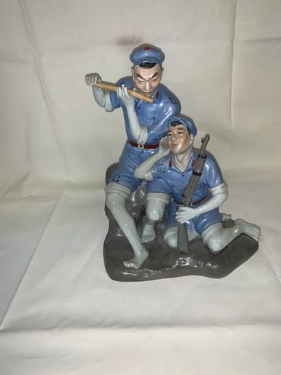 null Porcelain group featuring two soldiers of the People's Army of China.

China,...
