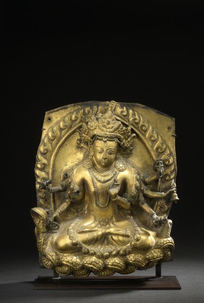 null Nepal - 17th/18th century

Embossed and gilded copper plate of a deity with...