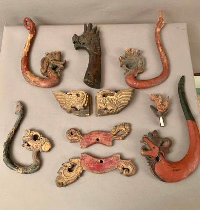 null Set of polychrome and gilded carved woods with various decorations, dragon heads...