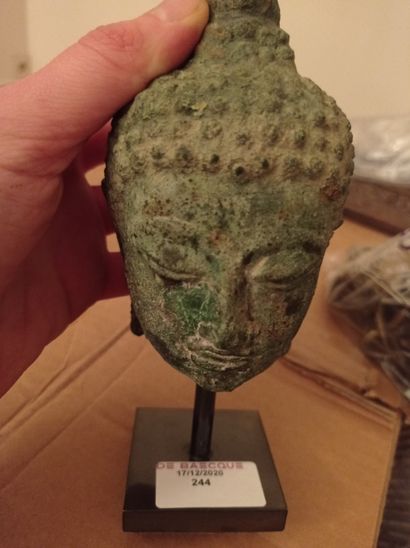 null THAILAND, Chieng Sen - 15th century

Bronze Buddha head with green patina, the...