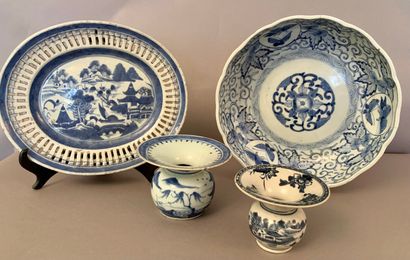 null Two porcelain dishes and two spittoons, blue monochrome decoration.

China and...