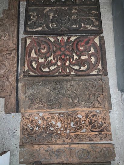 null Set of nine panels and two pediments in carved and openwork wood with scrolls...