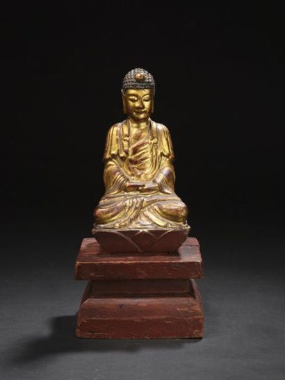 null Statue de Bouddha 
Bois doré laqué 
Probablement Vietnam
H. 21 cm AR
