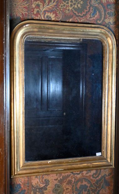null Mirror in gilded wood 

Louis Philippe period 

H. 97 cm W. 76 cm
