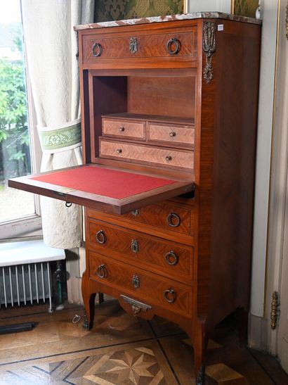 null Small secretary with flap in veneer wood, marble top

Louis XVI style 

H. 136...