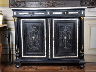 null Sideboard in blackened wood, brass inlay and burgau inlays, opening with two...