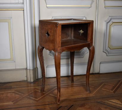 null Bedside table in walnut, opening by a niche openworked with rhombuses. XIXth...