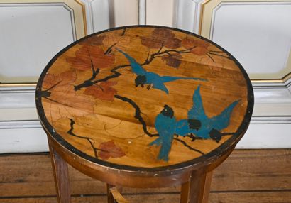 null Pedestal table with trays of pyrographed and painted wood with a decoration...