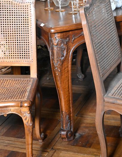 null Walnut table molded and carved with large acanthus leaves. Rectangular parquet...