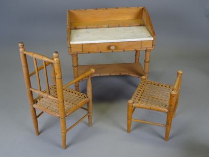 null Bamboo style doll's furniture including a marble topped chest of drawers, a...