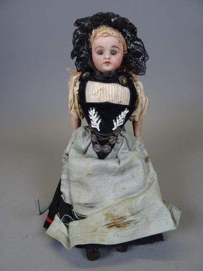 Antique doll with bisque head and bust, remaining...