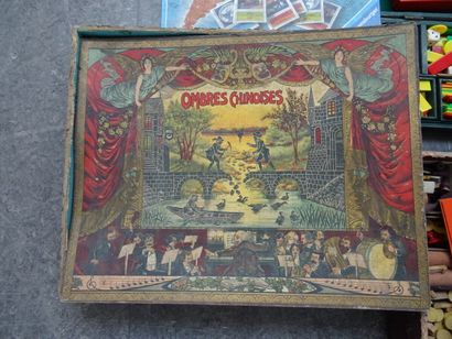 null Important lot of board games :

- The young caricaturist" set

- Chinese shadows"...