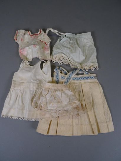 null Lot of antique doll clothes including: a coat, two hats, a jacket for a mignonette/little...